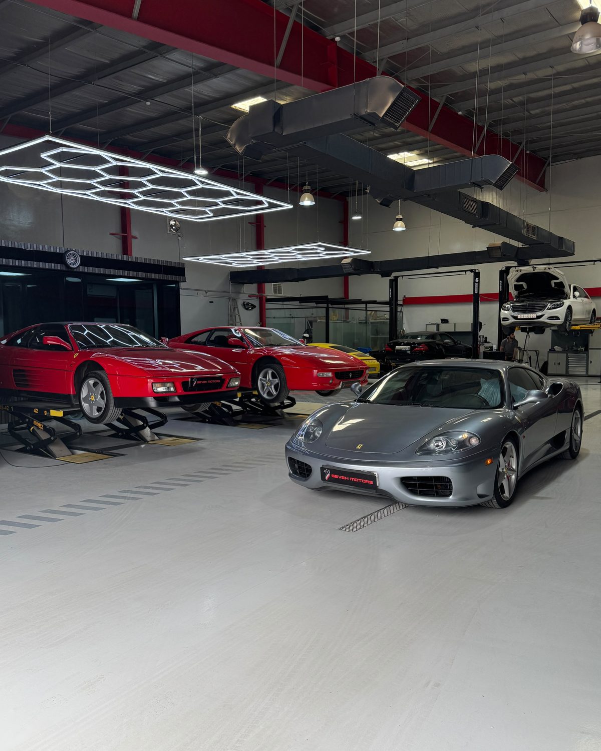 Ferrari 348, F355 and 360 Modena inside the workshop