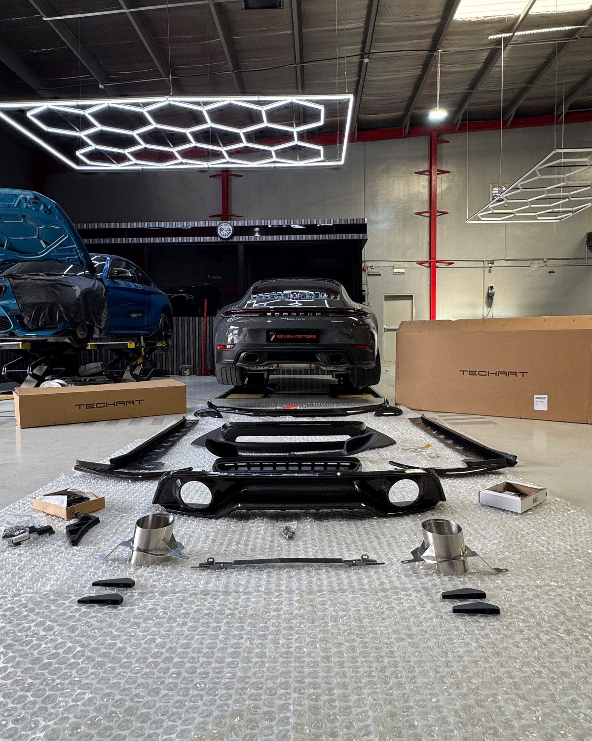 TECHART aerodynamic kit laid out before fitting to a Porsche 911 Carrera